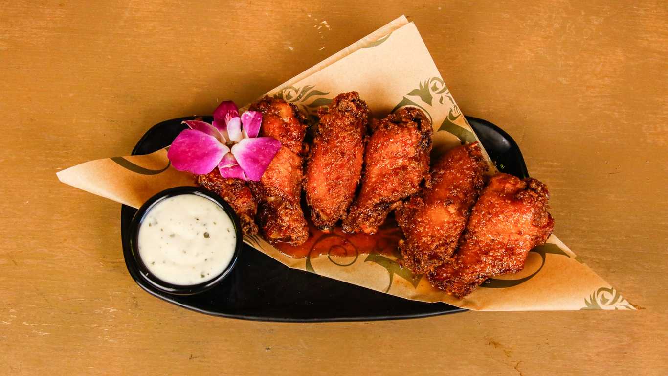 Crispy Greedy Wings served on $1 Wing Wednesday